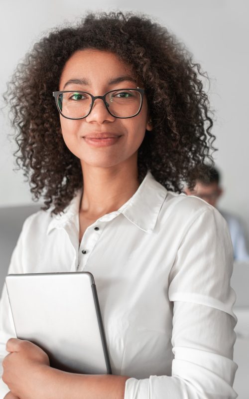 smiling-ethnic-female-recruiter-with-tablet-looking-at-camera-in-office.jpg smiling-ethnic-female-recruiter-with-tablet-looking-at-camera-in-office.jpg